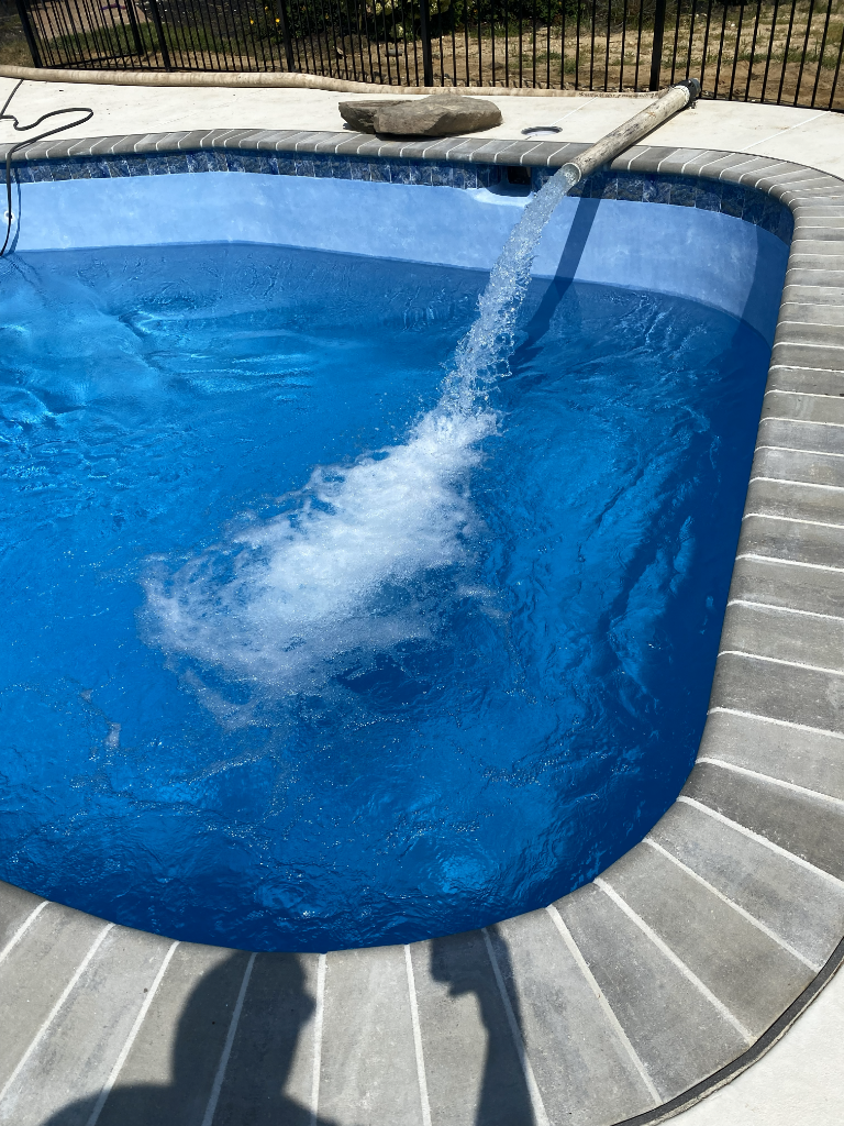 Pool being filled with bulk water delivery in New Jersey